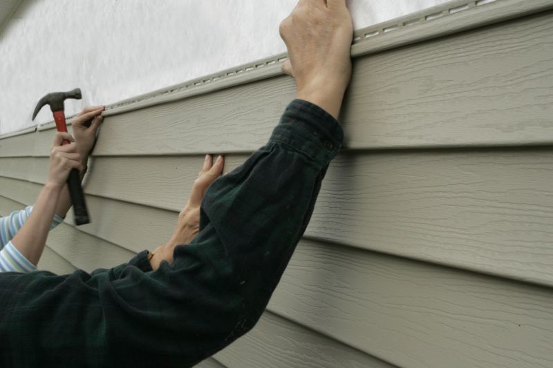 Aligning Vinyl Siding Panels